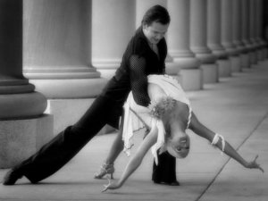 Does this holding this position look easy to you? Because it's not. (Image from Ballroom Dance Chicago blog)