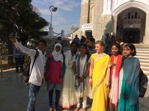 Posing for some quick selfies with people for whom I was as much a novelty as the famed Medak Cathedral.